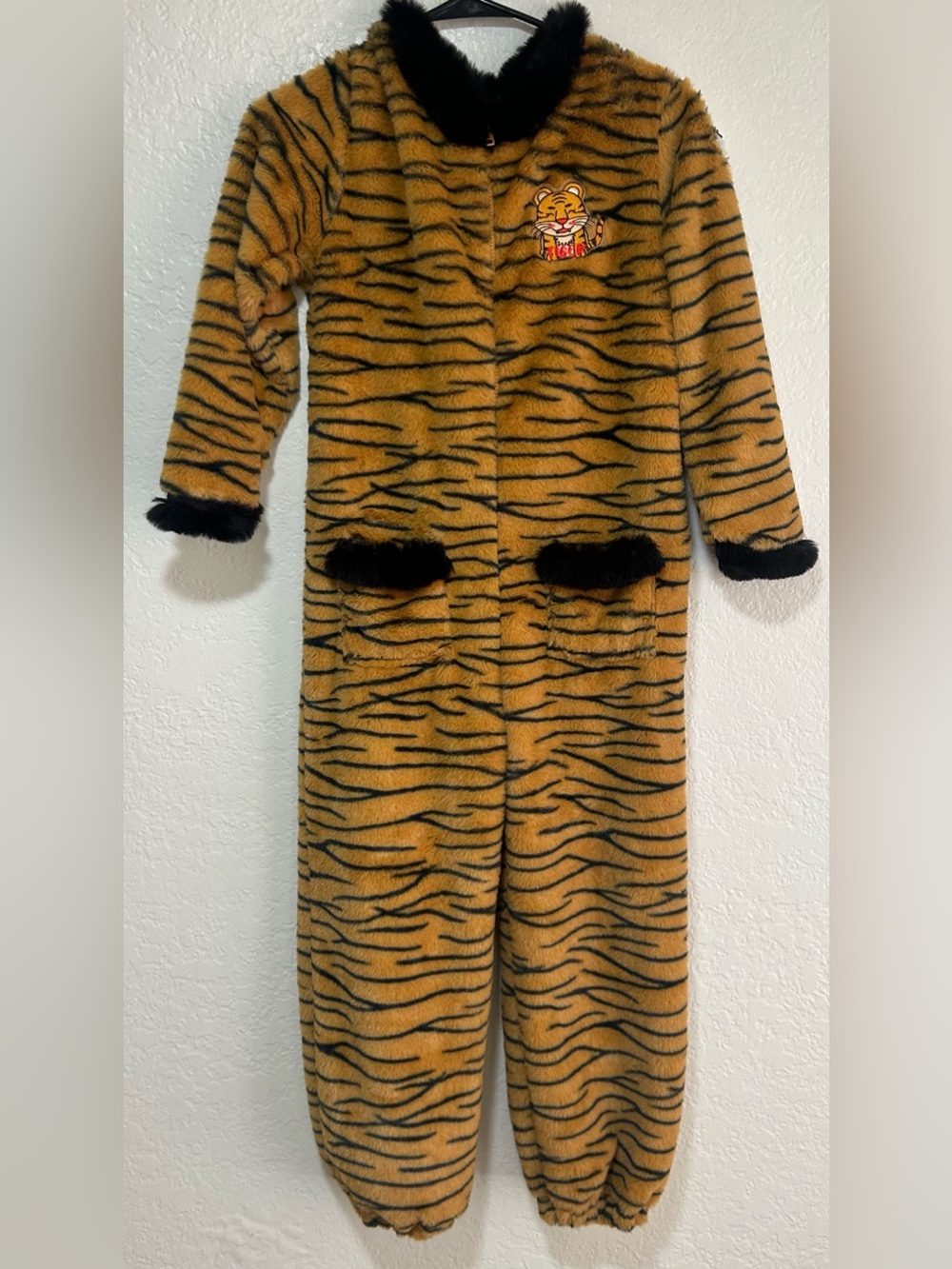 Tiger-Print Plush Onesie with Black Trim and Matching Hat